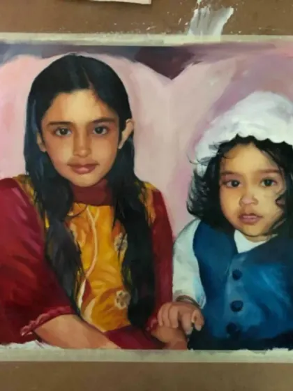 An oil portrait of two young sisters, created for a client in Canada. The soft lighting and gentle expressions highlight their sibling bond.