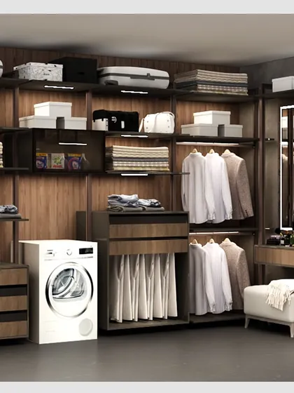 We designed this comprehensive walk-in closet to be a complete garment care station. It features dedicated sections for hanging clothes, folded items, accessories, and even integrates a washing machine, proving that functionality and luxury can coexist beautifully.