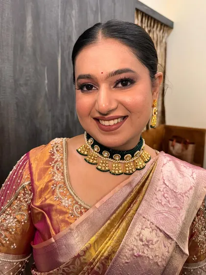 Another portrait of the bride, smiling and radiant.