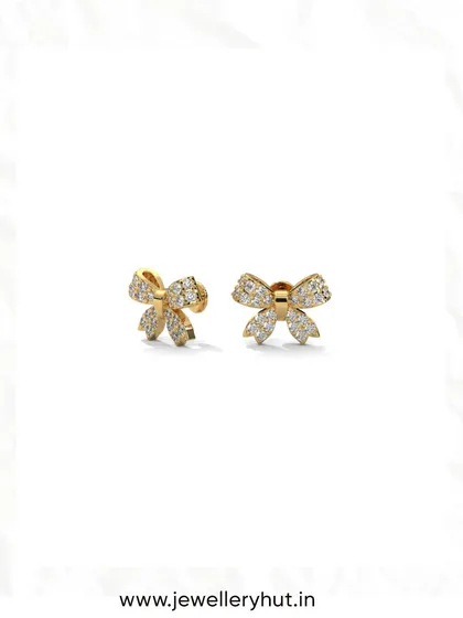 A close-up of our sparkling bow studs. These are perfect for adding a touch of feminine charm to any ear stack.