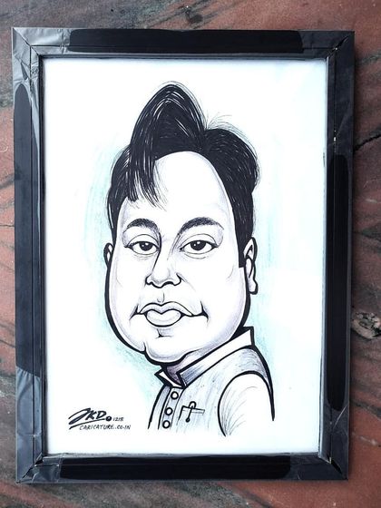 This framed caricature was a thoughtful gift from a wife to her husband. It's a simple, elegant, and personal way to show your love.