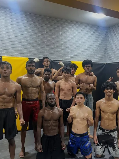 Meet the 1026 MMA fight team. These are the warriors who represent our academy in the cage and on the mats. Their ripped physiques and focused expressions show the discipline and brotherhood forged in sweat and hard work.