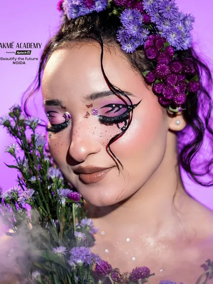 Unleash your creativity with fantasy makeup. This floral-themed look showcases the artistic skills our students develop, learning to use color, texture, and accessories to create living art.