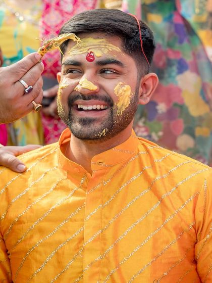 The groom's look is just as important. For the Haldi, we chose a bright, comfortable kurta with subtle silver stripes that caught the light beautifully and stood out in photos.