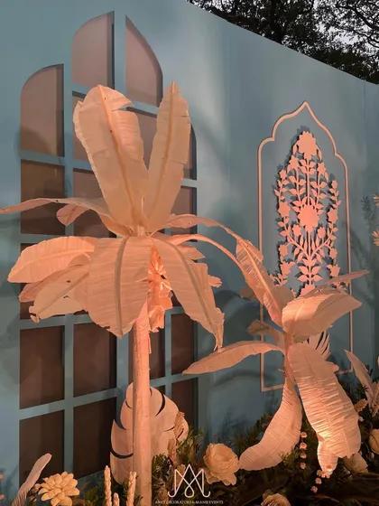 A close-up of the handcrafted paper palm trees, which added a unique, artistic element to the Moroccan-themed decor.