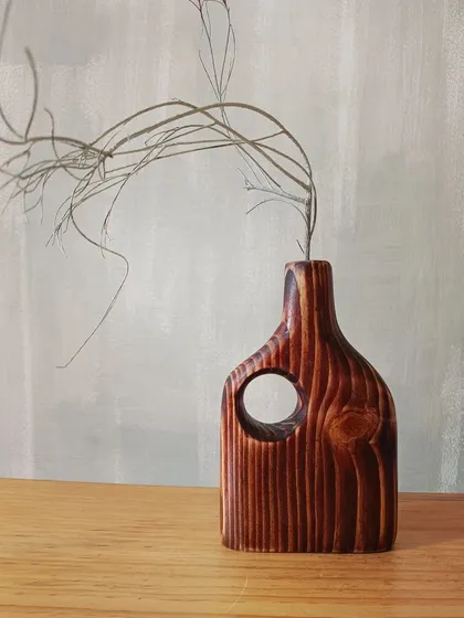 A duplicate of 156, the beautiful, deep-red stain on this wooden vase highlights the natural lines and knots in the pine wood, making each piece truly one-of-a-kind.