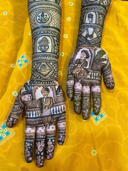 A classic take on the bride and groom portrait mehendi. The design includes traditional wedding elements like the sacred fire (agni) and kalash, representing blessings for the new couple.