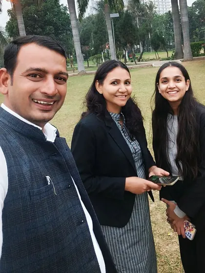 A selfie with female colleagues in a park, reflecting the diversity and camaraderie in our profession.