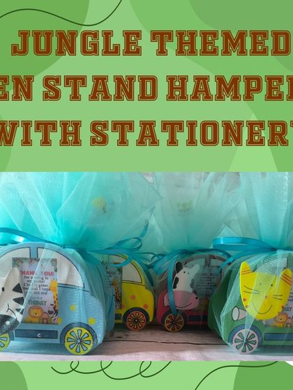 These jungle-themed pen stand hampers are beautifully wrapped in turquoise netting and filled with fun animal stationery.