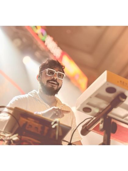 Our keyboardist, all smiles even during the technical run-through.