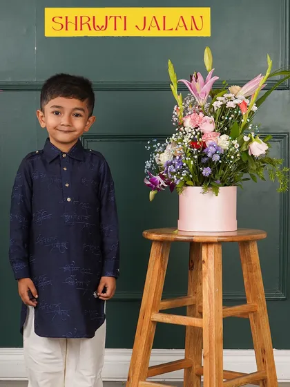 A classic navy blue kurta set. The dark, rich color makes it a great choice for an evening event or reception.