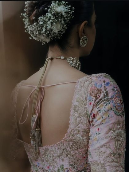 The back of a beautiful floral bun, showcasing the intricate arrangement.