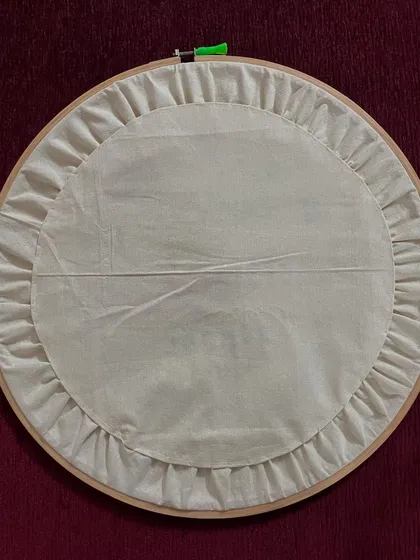 The back of my embroidered logo hoop. I always teach my students the importance of a neat finish, and I practice it in my own work as well.