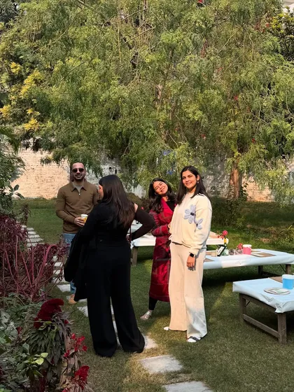 Candid moments of connection and laughter after a workshop. These events are as much about building community as they are about the yoga practice itself.