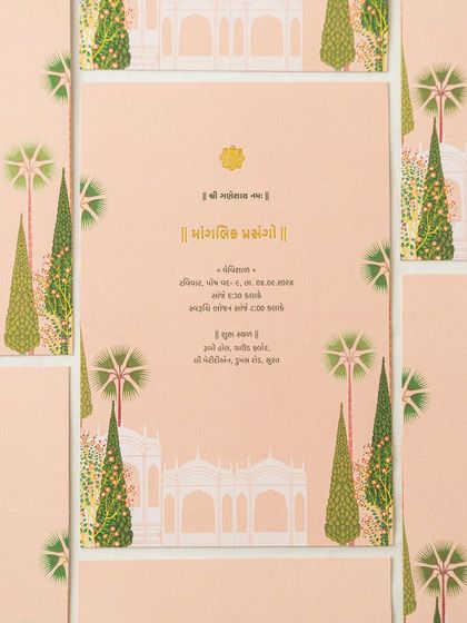 An invitation card written entirely in Gujarati script, set against a soft peach background with illustrations of classic Indian architecture and gardens. This is a wonderful way to honor family and heritage.