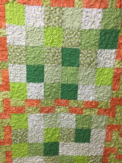 Another detail shot of the green and orange quilt.