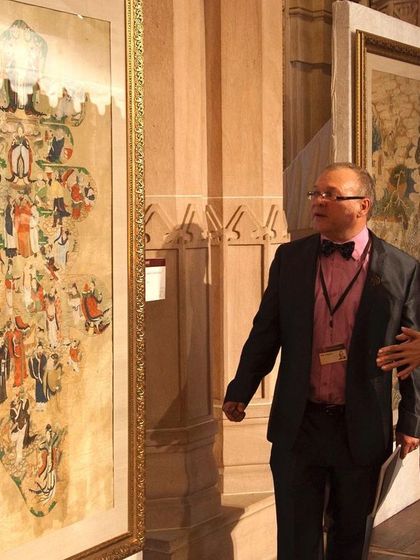 Here, a guest is being shown a magnificent painting at 'The Jodhpur Auction'. My team and I ensure that at every event, guests have the opportunity to learn the story and significance behind each piece.