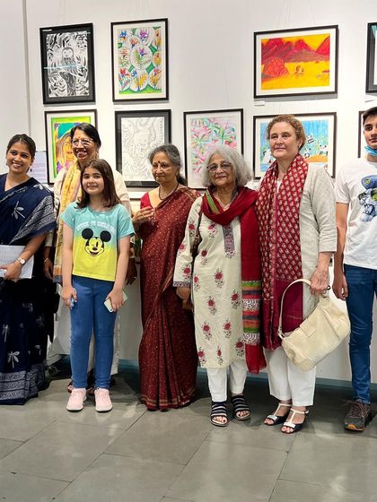 A proud group photo from our last Annual Art Exhibition, "Through the Eyes of a Child." It's one of the most exciting times of the year, celebrating the incredible work of our students.