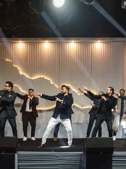 The groom's crew pointing in unison. Simple, powerful moves like this make a huge impact in a group dance.