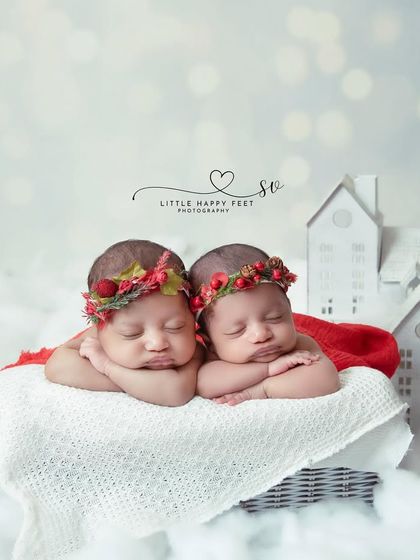 Double the sweetness for the holidays! These twin sisters, with their festive berry headbands, are ready for their first winter together.