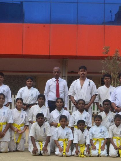 Students of the main HPKA branch after their belt grading exam. You can see the different belt colors, showing the levels of progression.