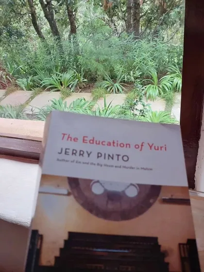 'The Education of Yuri' by Jerry Pinto finds a perfect reading spot by a window overlooking the lush greenery of the retreat.