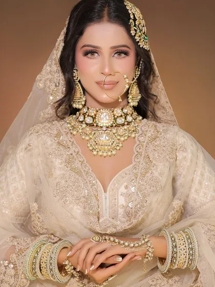 Three stunning shots of our pearl white chikankari lehenga. This is a perfect option for creators working on Nikah, day wedding, or minimalist luxury themes.