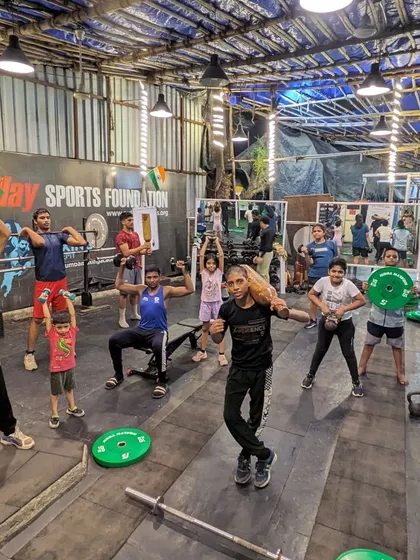 We are more than a gym; we are a team. This is a typical high-energy session where kids and adults train side-by-side, pushing each other to get stronger. You'll find a mix of kettlebells, medicine balls, and bodyweight exercises, all done with a spirit of community.