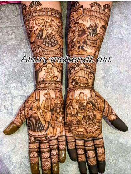 A full family celebration in henna. This design includes portraits of the couple, their family members, and even a small Ganesha figure for good fortune.
