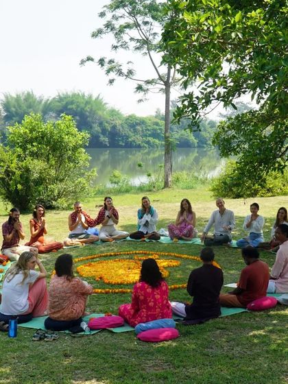 Captions will describe the specific yoga practice shown (e.g., "Practicing Sutra Neti, a traditional yogic cleansing technique," "A Hatha yoga class in our Chakra Hall," "Finding inspiration in our mistakes and using them as a platform for growth.").