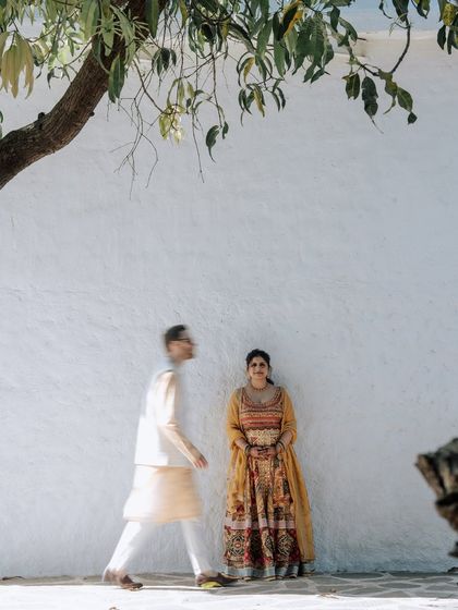 A collection of portraits from a beautiful Haldi photoshoot. I coordinate with the photo team to capture a variety of shots, from romantic close-ups and playful kisses to stylish individual portraits, all within a cohesive, sun-drenched theme.