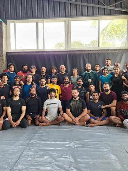 This is our community. A packed mat for the seminar with UFC fighter Dustin Stoltzfus shows the dedication of our students. We foster an environment where everyone is serious about learning and supporting each other's growth.