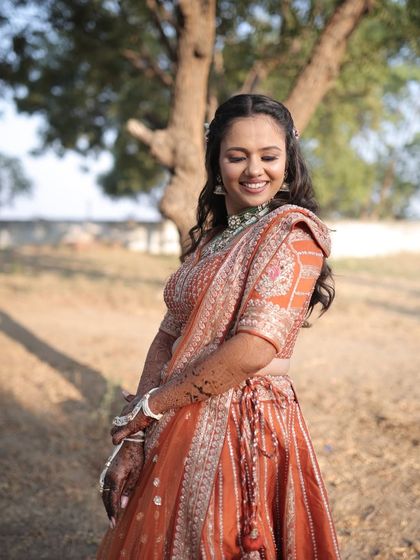 The complete look, from the floral hair accessories to the intricate lehenga. Every detail was planned to create this stunning engagement style.