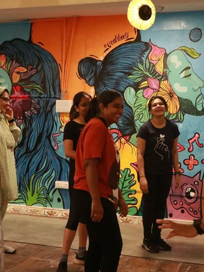 Laughter and fun during a workshop. It's not just about dancing; it's about creating happy memories.