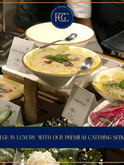 Indulge in luxury with our premium catering. A close-up of our Mediterranean dips, including creamy hummus, ready to be enjoyed with fresh pita bread.