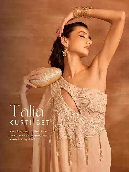 The Talia Kurti Set is an embrace of artistry. I designed this one-shoulder kurti with striking cutouts, elegant silhouettes, and intricate floral motifs for the modern woman.