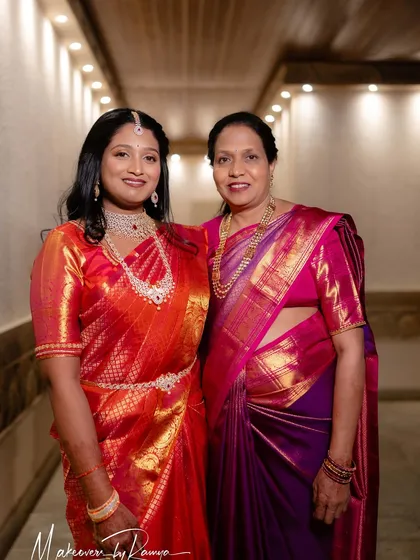 A beautiful moment with Sanjana and her mother at the reception. I specialize in makeup for all ages, including mature skin, ensuring everyone in the family has that special glow. It's so important that mothers feel just as radiant as their daughters on the big day.