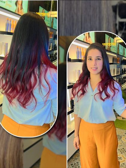 Another look at a classic cherry red hair color. This image shows how a vibrant red can be styled for a chic and modern look, perfect for making a statement.