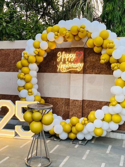 A wide shot of the outdoor anniversary setup, showing how it creates a festive focal point.