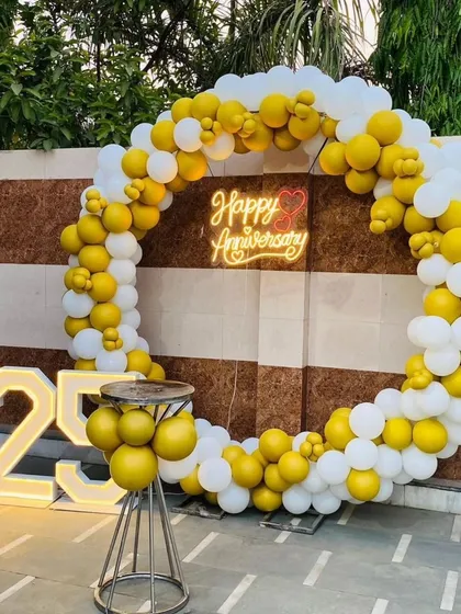 A wide shot of the outdoor anniversary setup, showing how it creates a festive focal point.