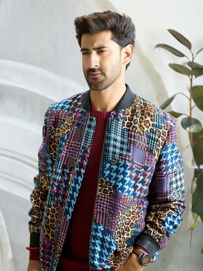 This multi-patterned jacket is for the discerning gentleman who wants to command the spotlight. Its sophisticated and unique aesthetic ensures you will stand apart.