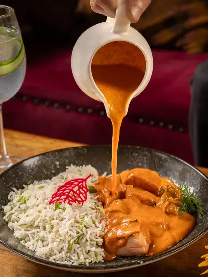 Dive into coastal indulgence with our Malvani Salmon Curry. The richness of Malvani spices meets the elegance of tender salmon in this symphony of flavors from the shores of western India.