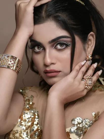 A dramatic close-up of the graphic eyeliner and flawless skin finish, showcasing advanced techniques taught in the class.