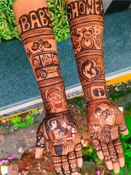 A close-up of the intricate storytelling in a baby shower mehandi, with multiple scenes depicting family and babies.