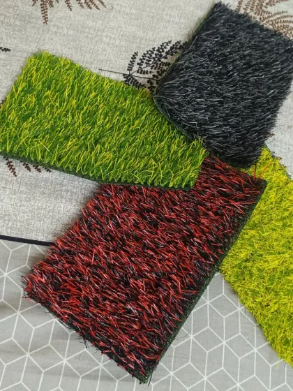 I stock more than just green turf. This image shows a few of my colored and fusion grass options, including red and black, yellow and green, and solid black, suitable for decorative use or branding.