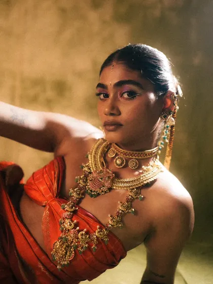 A modern take on traditional beauty for an editorial shoot. I focused on a vibrant, metallic eyeshadow to complement the stunning gold jewelry, creating a look that feels both classic and contemporary.