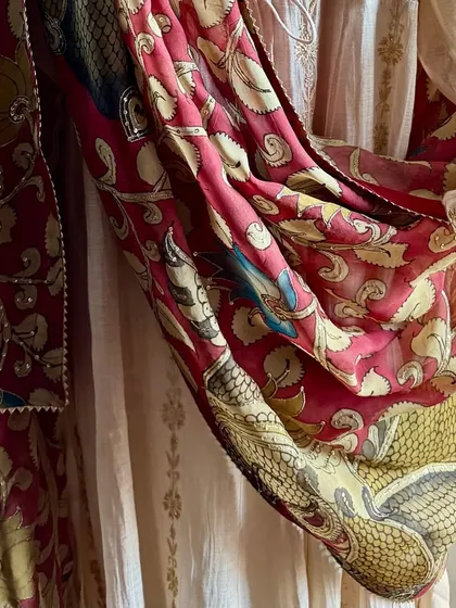 A detail shot of the draped Kalamkari dupatta against the subtle texture of the Tissue Chanderi Anarkali.