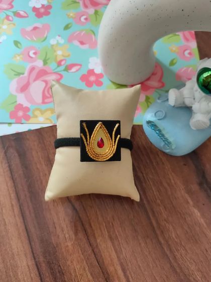 My collection of decorative elastic hair bands. Each one features a unique handmade centerpiece, including gotapatti, Kundan work, zardozi, and bead embroidery.