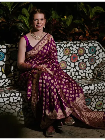 This was such a special moment. For her Mehendi, Rachael chose to wear a traditional deep purple brocade saree belonging to her husband Viraj's late mother. It was an honor to help her style this priceless heirloom and create a look that was both beautiful and deeply meaningful.