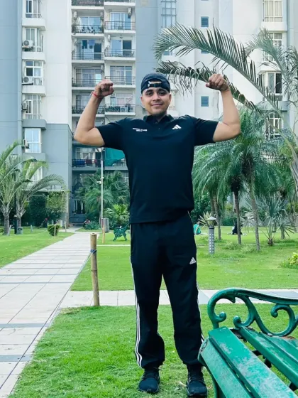 Double bicep flex in the park.